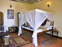 Arabian Nights Suites - Zanzibar. Suite bedroom.